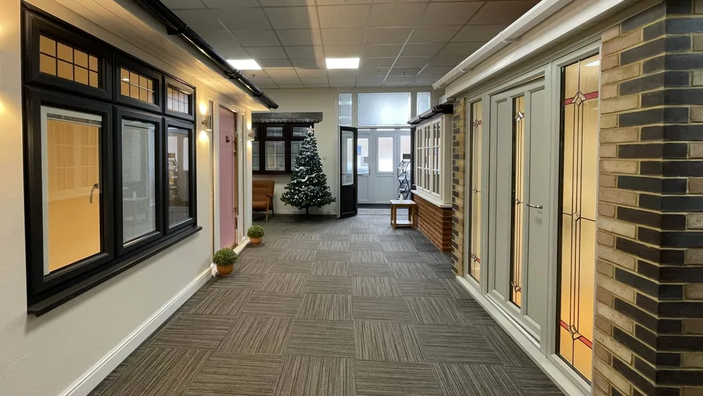 Dark-framed window and door styles in the showroom